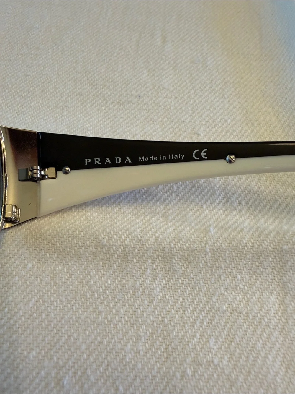 Prada women’s Silver Frame Gray Lens Aviator Sunglasses - Gradient Gray